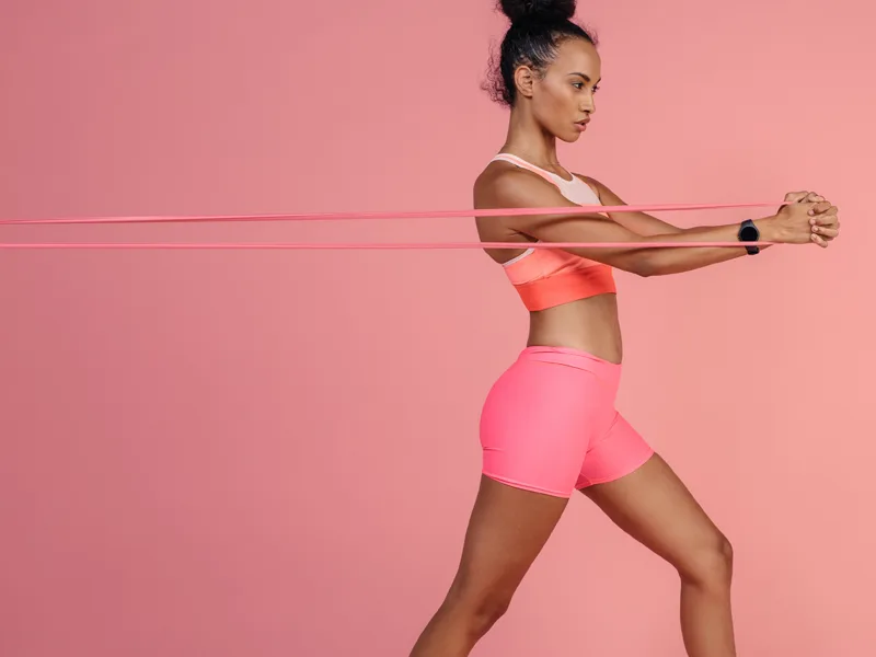 Person exercising with resistance band